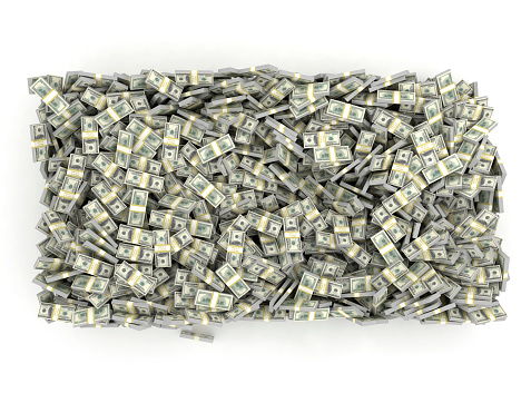 Top view of pile of money. US dollars budles on white background