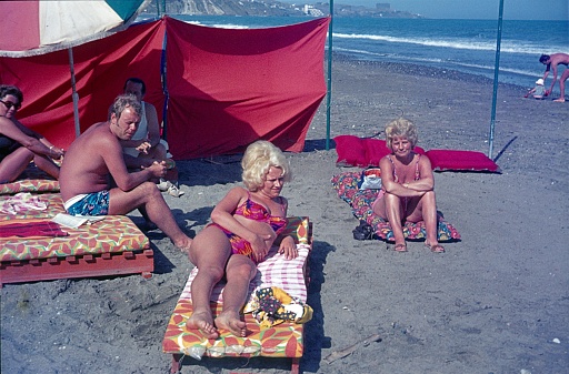 Catalonia (exact location unknown), Spain, 1975. Holidaymakers from Central Europe on a Spanish Mediterranean beach.