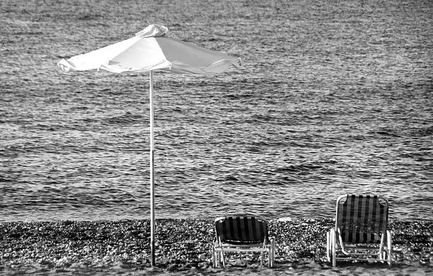 istock Beach umbrella and sunchairs 149819649