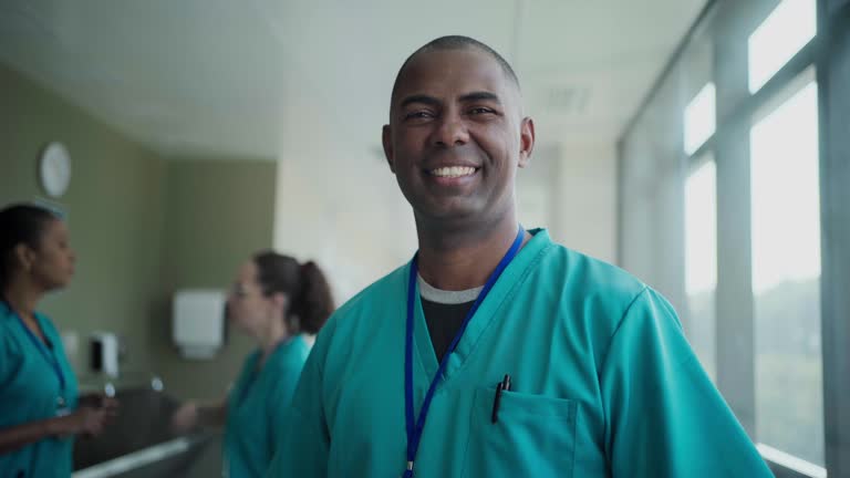 Portrait of male nurse in hospital clinic