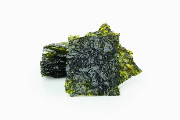 istock Dry seaweed nori isolated on white background 1498199428