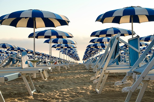 Blue and white beach umbrellas
