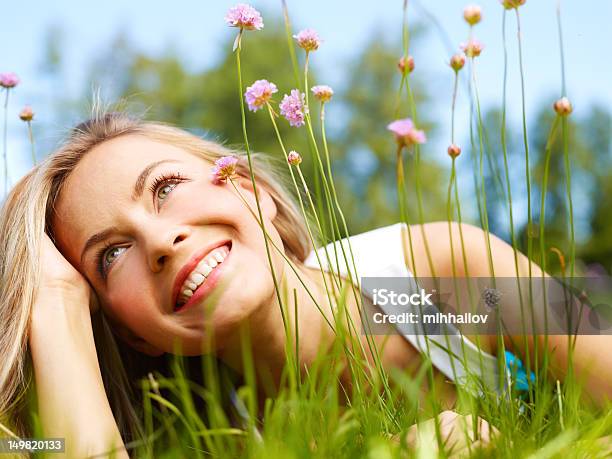 Girl In A Grass Stock Photo - Download Image Now - Women, Meadow, Lying Down