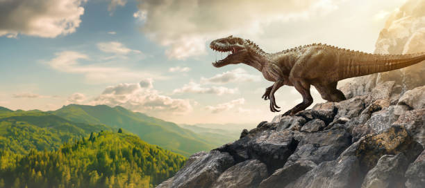 istock Dinosaur On Top Of Mountain Rock 1498206666