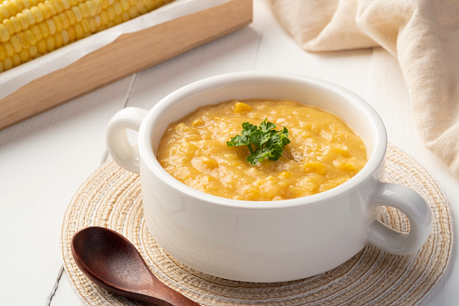 Creamy corn Pottage soup on white bowl,healthy food style