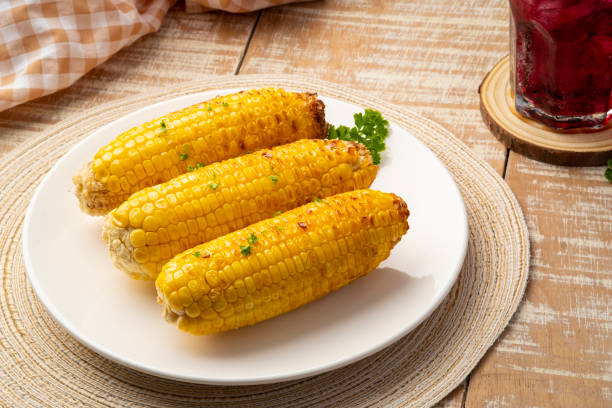istock Grilled fresh corn with butter and parsley 1498208836