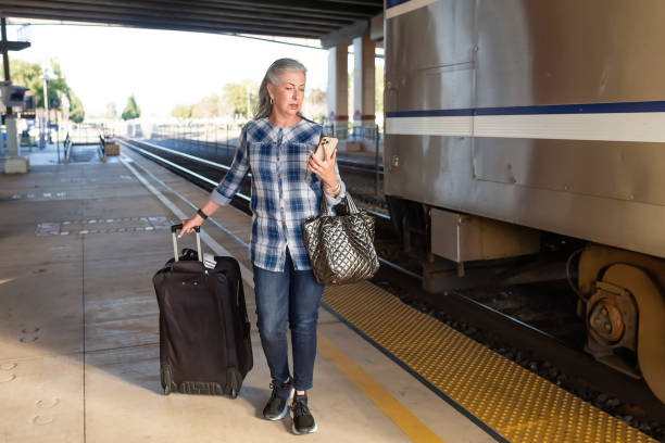 istock Woman looking at directions on phone 1498209573