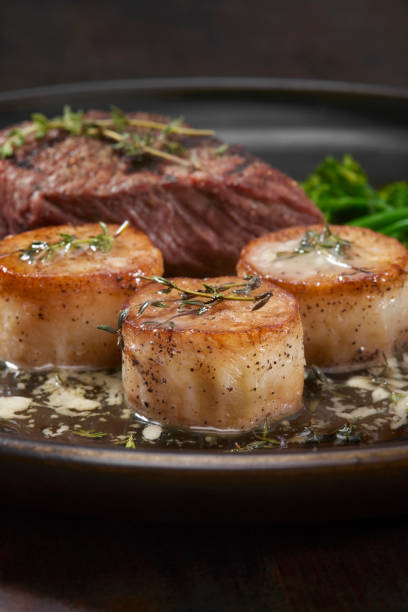 istock Fondant AKA Melting Potatoes in a Garlic and Thyme Butter 1498210465