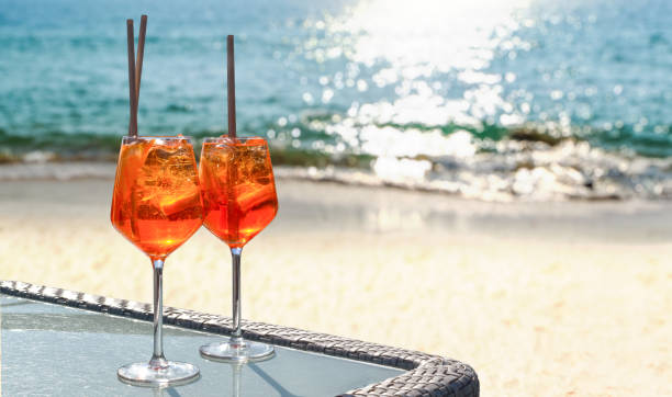 two Spritz on a summer evening in a mediterranean restaurant two Spritz on a summer evening in a mediterranean restaurant goa beach party stock pictures, royalty-free photos & images
