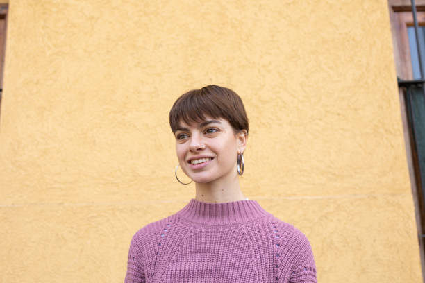 istock Low angle portrait of smiling woman 1498214983