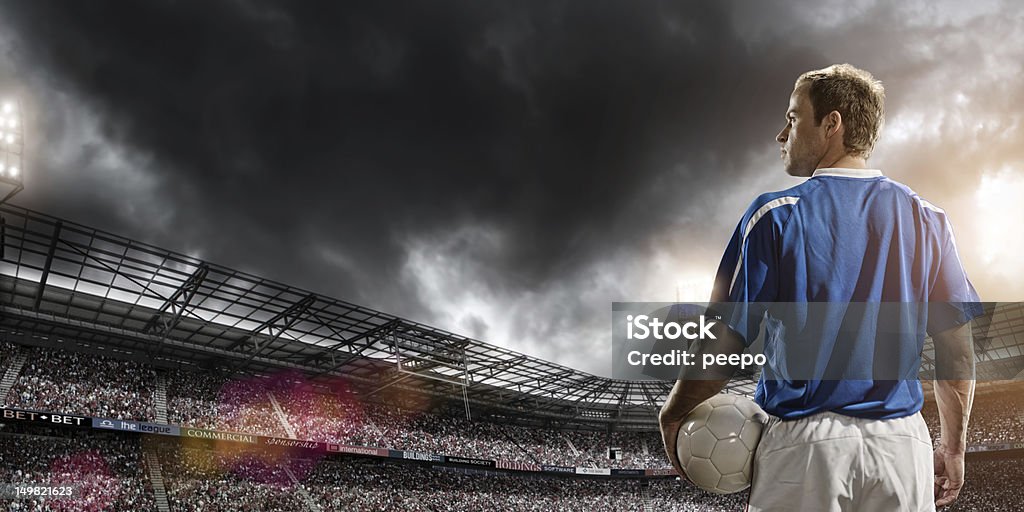 Héroe de fútbol - Foto de stock de Vista posterior libre de derechos