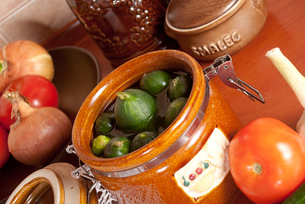 Pickled cucumbers in a rural kitchen stock photo