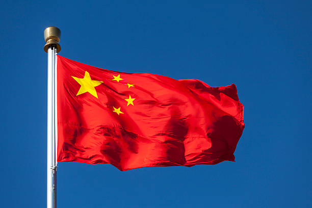 istock China flag fluttering in the wind 149822028