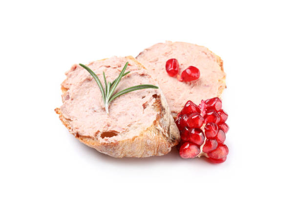 istock Baguette slices with pate isolated on white background 1498227509