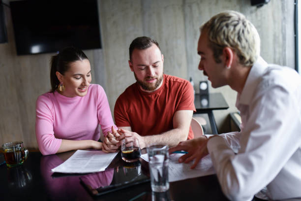istock Newly Married Couple Creating Will With Lawyer 1498227588
