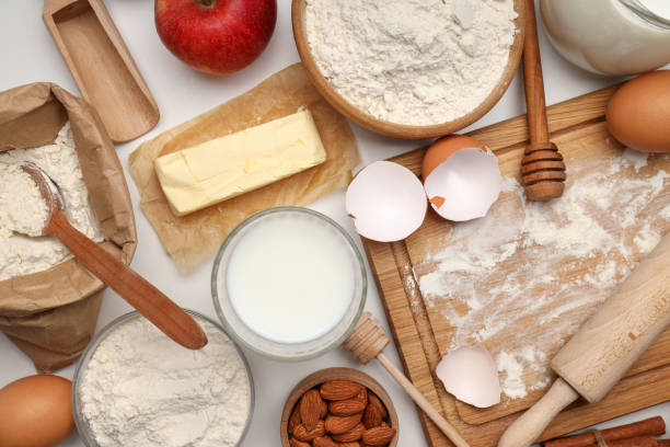 istock Ingredients for pie or cake cooking on light table 1498230317