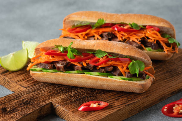 istock Banh mi. Vietnamese sandwich close-up, side view, selective focus. 1498230726