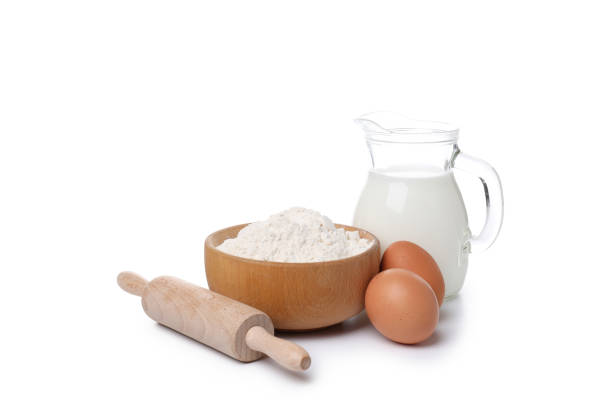 istock Ingredients for cooking cake isolated on white background 1498231307