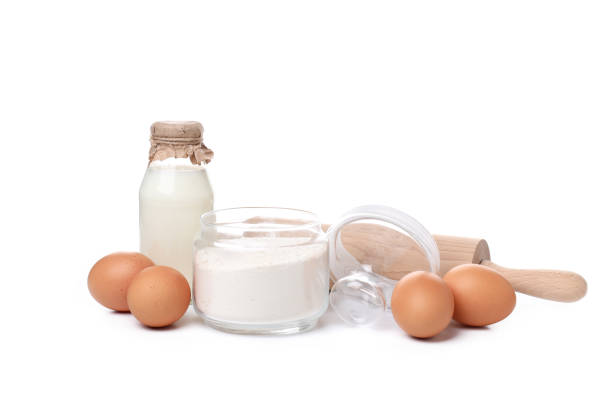 istock Ingredients for pie or cake cooking isolated on white background 1498231368
