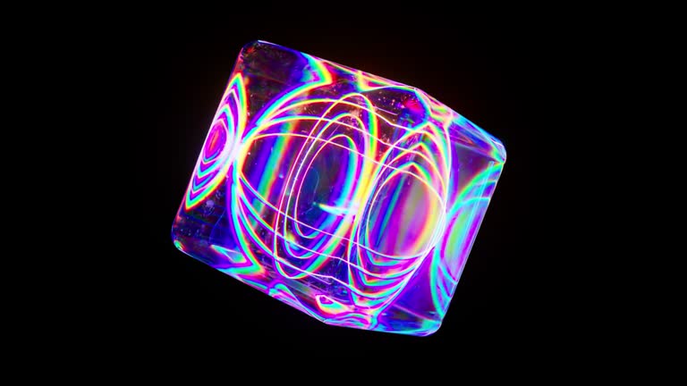 Blue transparent neon cube rotates on a black background. Laser lines inside the cube create shapes. Kaleidoscope.