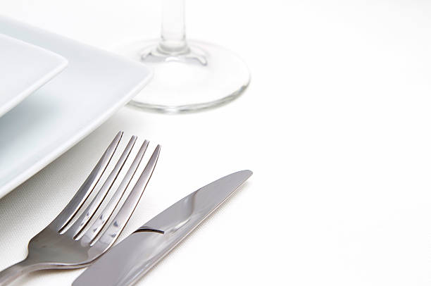 istock white square china plates with silver cutlery 149824209