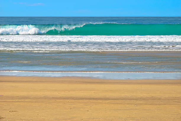 Turquoise Breaking Wave stock photo