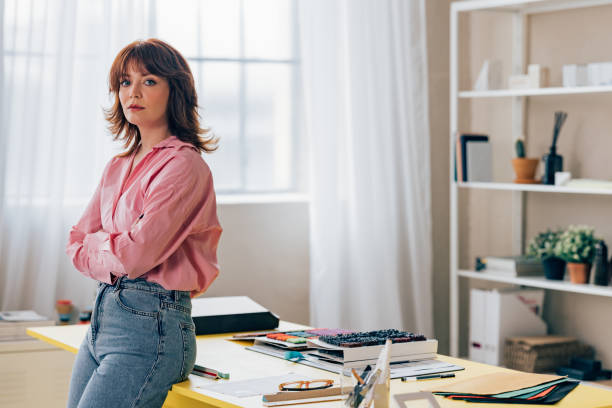istock Confident Female Entrepreneur Standing in her Office 1498243531