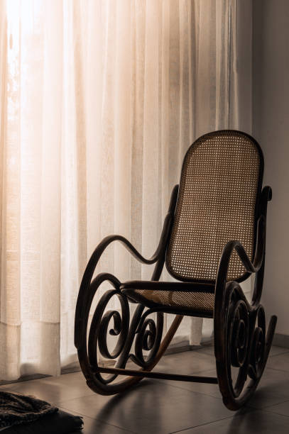 istock Empty Rocking Chair: A Silent Reminder of Absent Elders 1498250822