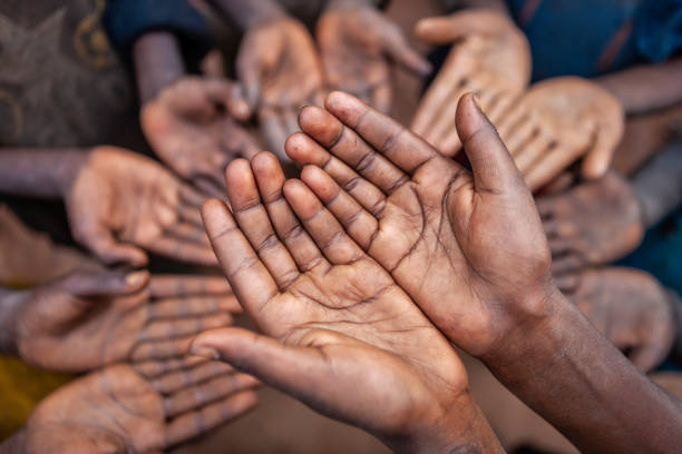 istock Hungry African children asking for help, Africa 1498255906
