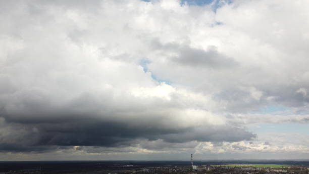 istock Large dark rain clouds in sky. Big rain clouds move across the sky. 1498256531