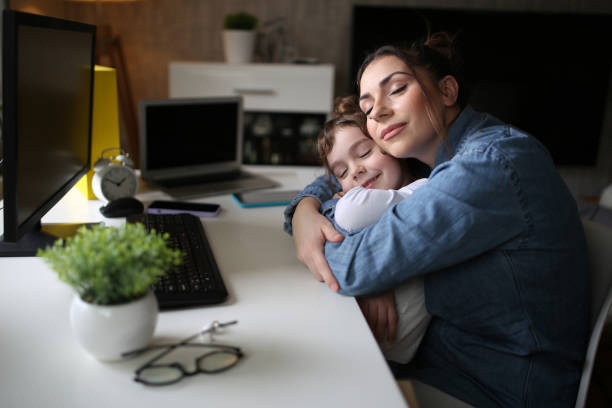 istock Mom working from home stock photo 1498256681