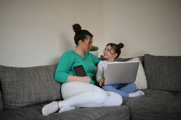 istock Mom working from home stock photo 1498256962