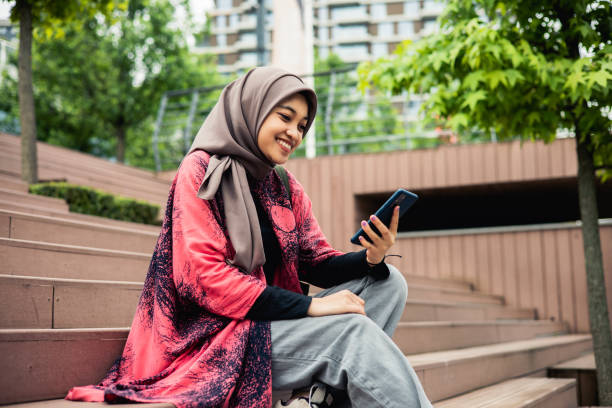 istock Young woman using a smartphone 1498266479