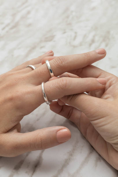 istock silver rings on the hand in studio, beautiful jewelry, objects as accessories 1498268591