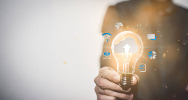 istock Hand holding Light bulb Global Internet connection. Business global internet connection application technology and digital marketing Financial and banking Digital link tech big data. 1498269170
