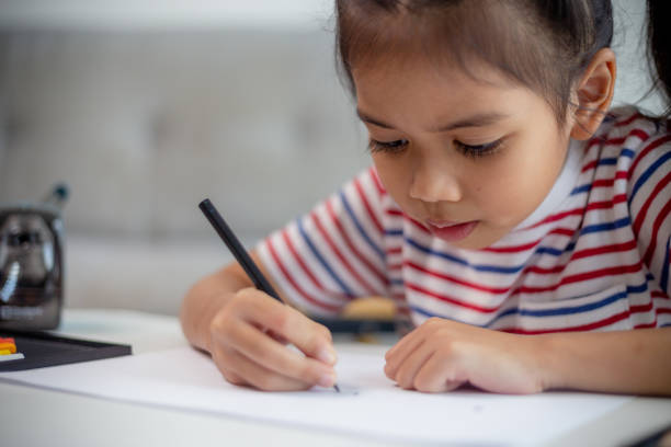 istock Asian child students back to school doing homework to learn new ideas think. Education concept. 1498270484