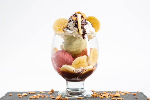 istock ice cream cup with fruits 1498275296