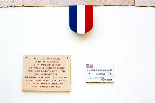 Grenoble, France: WWII memorial plaques at the American Corner in Old Town Grenoble. On August 22, 1944, American soldiers parachuted into Provence to join the French Resistance and eventually liberate Grenoble; Colonel Philip Johnson played a major role.