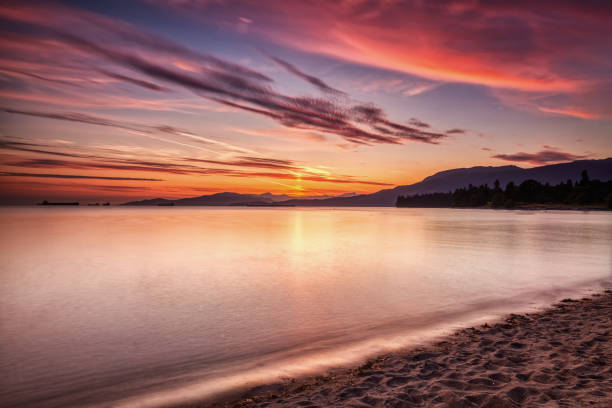 istock sunset glow view from English Bay, Vancouver, BC, Canada 1498279361