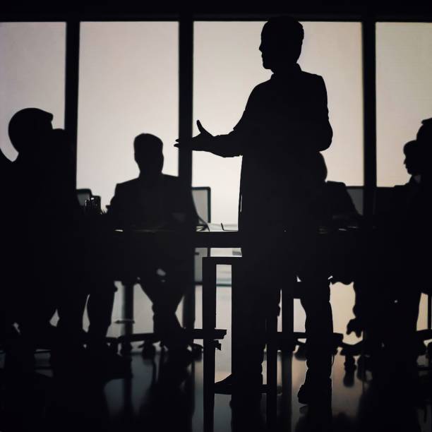Silhouette of an office meeting