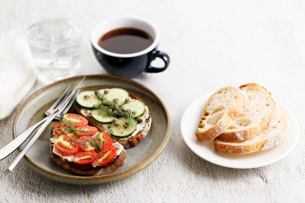 istock Healthy cucumber and tomato toast. 1498289609
