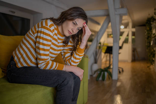 istock Young woman in pain 1498302136