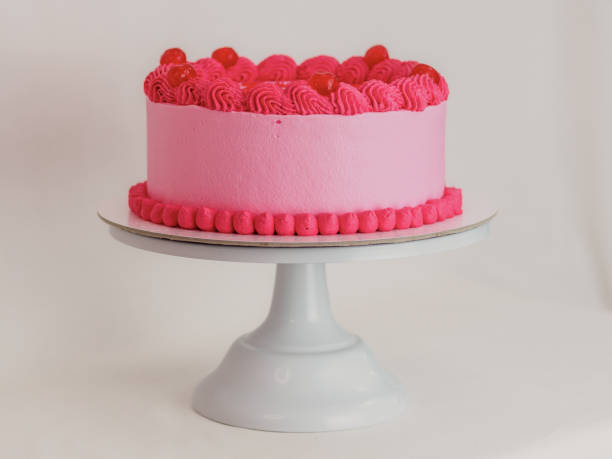 istock frosted icing elegnt cake with funny lettering topping. Mothers day celebration cupcake. 1498302472