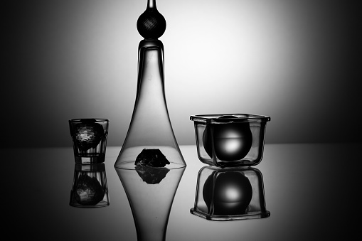 An abstract compositions of glass objects with reflections