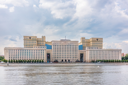 View of the Ministry of Defence of Russian Federation, and Moscow river embakmenTranslation of the inscription on the facade - Ministry of Defense of the Russian Federation
