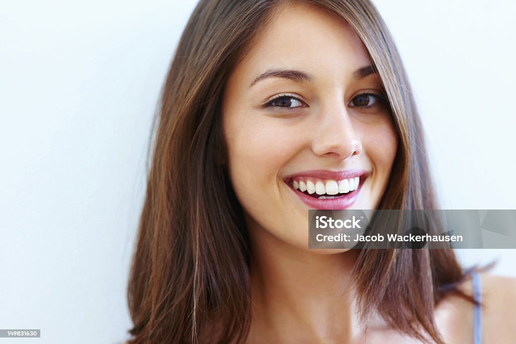 Pretty girl smiling Closeup of pretty young girl smiling Smiling Stock Photo