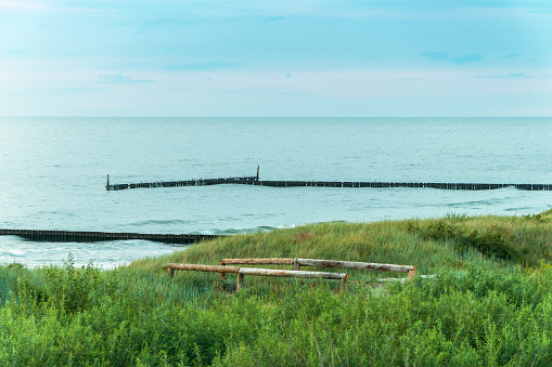 Baltic Sea. Poland. Coast. Seagulls on the breakwater