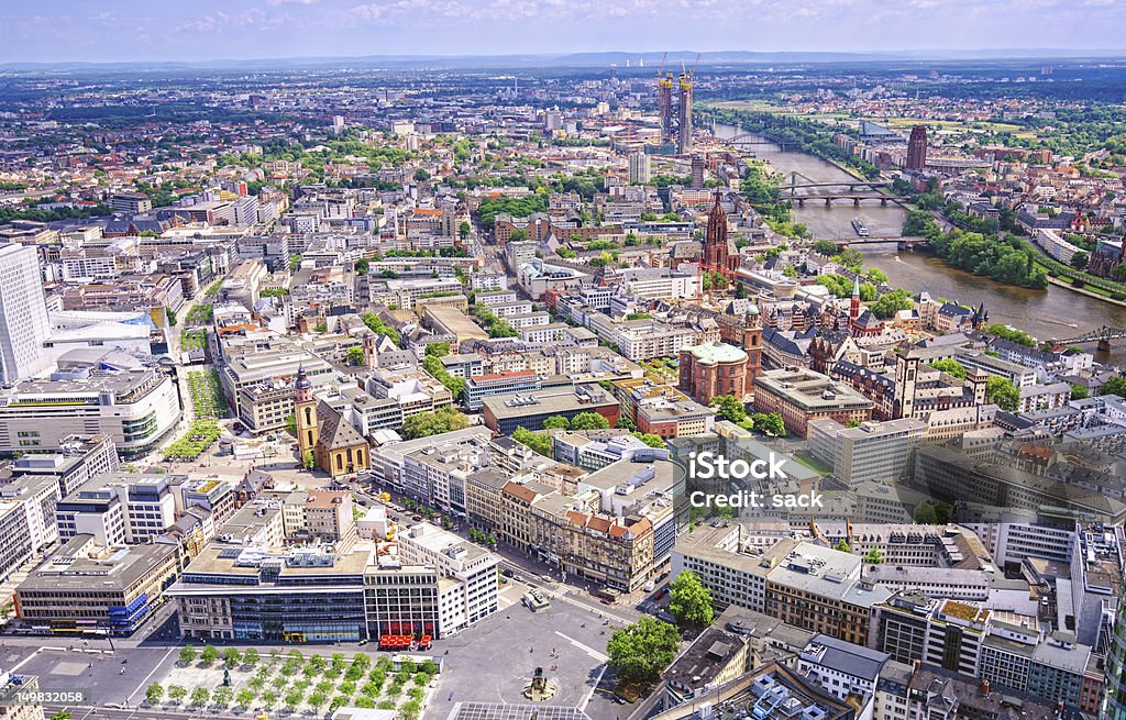 Aerial view over Frankfurt Aerial view on the Frankfurts´ famous Hautwache, the shopping district (Zeil), the historic center (Old Town/Altstadt) with the Römer and St. Bartholomäus Cathedral, the river Main and the district Sachsenhausen on the opposite side of the river. In the further distance the new EZB (European Central Bank) building is currently erected. Frankfurt - Main Stock Photo