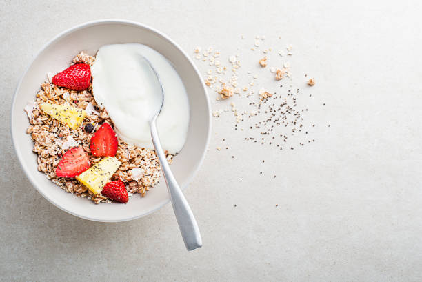 istock Granola oatmeal with Greek yogurt and fruit 1498323570