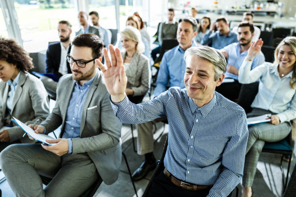 istock Engaging business seminar in a board room! 1498323775